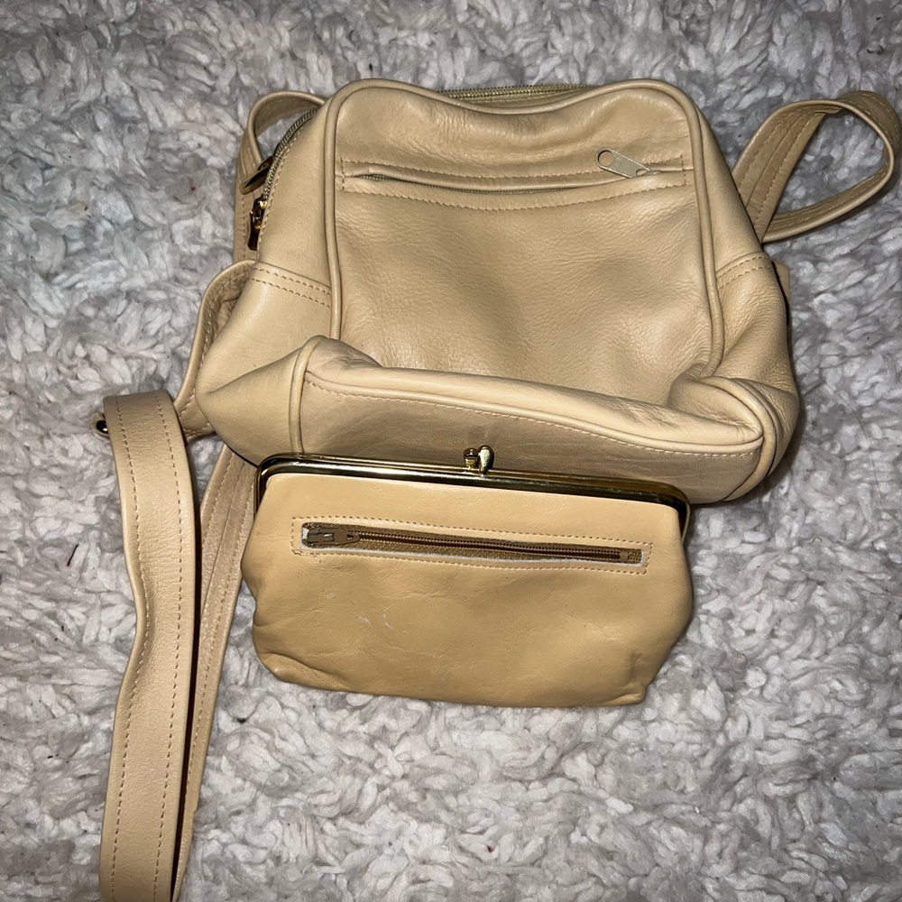 Tan/yellow/cream leather crossbody bag with clutch.